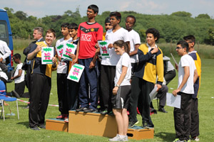 Boys relay teams getting certificates