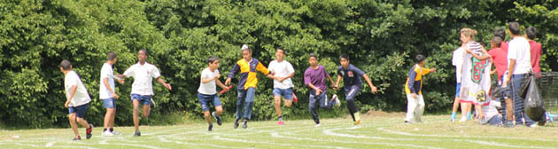 Boys relay hand-over